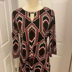 Whit House Black Market Patterned shirt with Keyhole Neckline